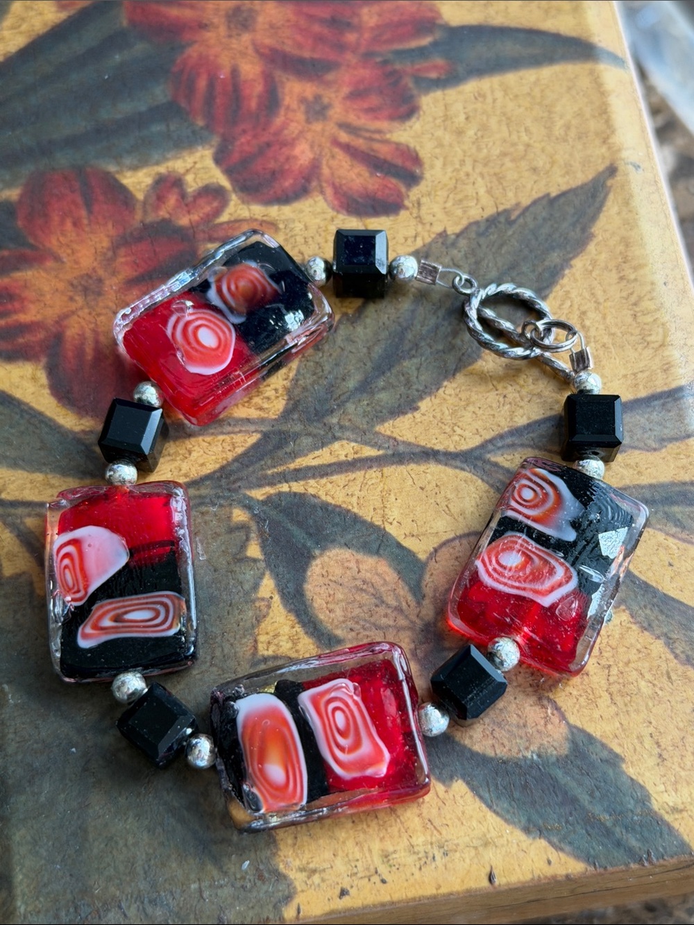 Artisan made bracelet sterling silver rope toggle clasp black and red
